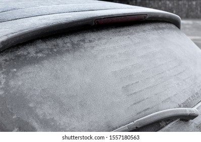 Frozen in the ice black car. Hoarfrost. Icy Accumulation. Ideal for concepts.