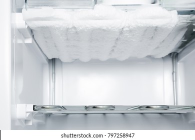 Frozen Ice In The Empty Freezer. Problem And Solution Concept.