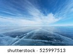 Frozen Lake Baikal. Beautiful stratus clouds over the ice surface on a frosty day. Natural background