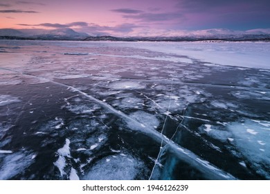 The Frozen Lake Torneträsk In Swedish Lapland. Beautiful Ice Forms Create An Amazing Sight.