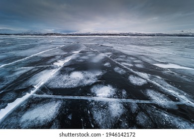 The Frozen Lake Torneträsk In Swedish Lapland. Beautiful Ice Forms Create An Amazing Sight.
