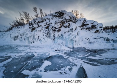 The Frozen Lake Torneträsk In Swedish Lapland. Beautiful Ice Forms Create An Amazing Sight.
