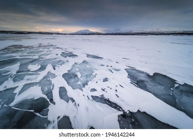 The Frozen Lake Torneträsk In Swedish Lapland. Beautiful Ice Forms Create An Amazing Sight.
