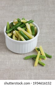 Frozen Legume Vegetables - Green Bean - In Bowl On Linen Background, Closeup, Saving Leftovers, Food Storage Concept And Eating Meals At Home Concept