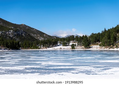 Frozen Lily Lake At Winter, January With Cold Weather And Snow. Rocky Mountains, Estes Park, Colorado, USA