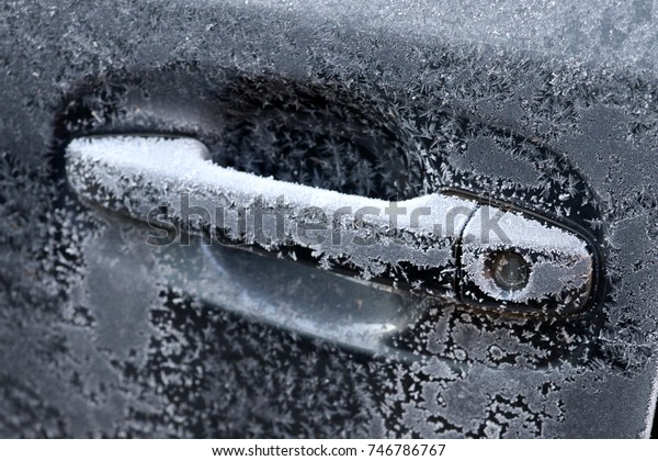 Frozen lock on car door\
handle