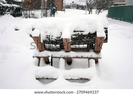 Frozen Log for Cutting in Winter