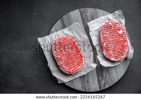 frozen meat cutlets minced meat pork, beef, chicken fast food semifinished meal food snack on the table copy space food background rustic top view