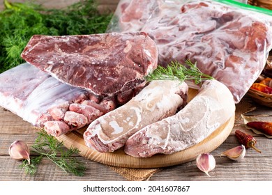 Frozen Meat. Frozen Offal, Liver, Heart, Stomachs In A Plastic Bag On A Table. Frozen Products. Frozen Food