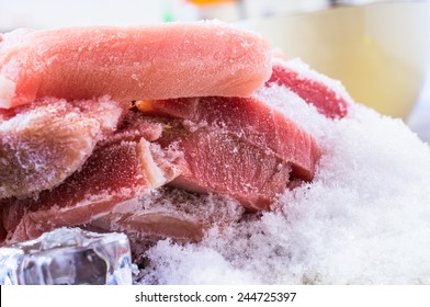 Frozen meat pork slices with hoarfrost
