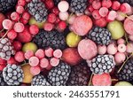 Frozen mixed berries as background, top view. Red currant, white currant, blackberry,  gooseberry and black currant.