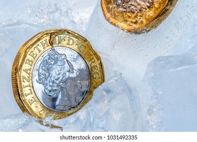 Frozen New British One Pound Sterling Coin Up Close Macro Inside Ice Cubes