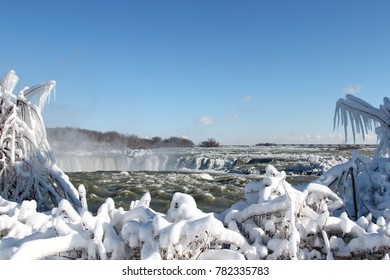 Frozen Niagara Falls, Canada Side, With Ice And Snow Near Th Edges