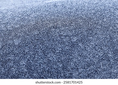 Frozen pattern of hoarfrost and frostwork structure on the glass. Color texture photo for background.