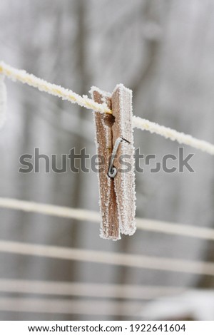 frozen peg on a clothesline
