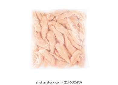 Frozen Pieces Of Chicken Fillet On An Isolated White Background.Chicken Fresh Meat In A Transparent Bag.