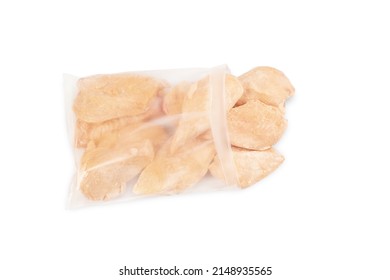 Frozen Pieces Of Chicken Fillet On An Isolated White Background.Chicken Fresh Meat In A Transparent Bag.