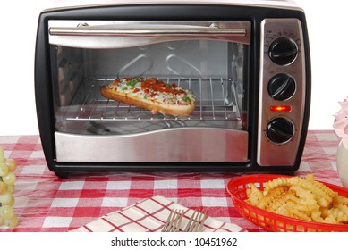 A Frozen Pizza Heats In The Oven