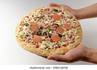 Frozen Pizza On A White Background