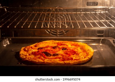 Frozen Pizza Reheated In The Electric Oven