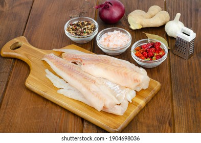 Frozen Pollock Fillet. Cooking Fish Dishes. Photo