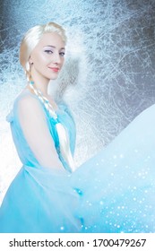 Frozen Princess On The Snowy Silver Background Close Up. Art Processing