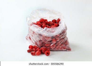 Frozen Raspberries In Clear Plastic Bag