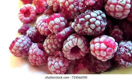 Frozen raspberry berries close up