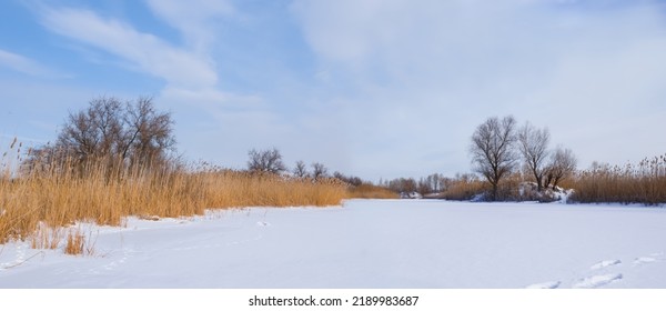 Frozen River Covered By Snow, Winter Outdoor Scene