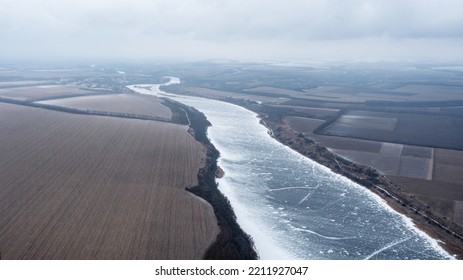 Frozen River Covered With Snow. Frozen River In The Snow. Winter Landscape, Top View