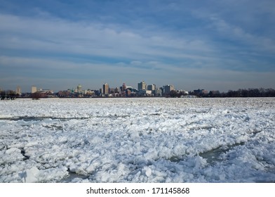 Frozen River And Harrisburg PA City Skyline With Capitol Building In Background