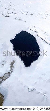 frozen river in rovaniemi finland in winter with ice and snow