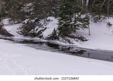 A Frozen River In Winter In Upper Peninsula, Michigan, USA, Lake Superior, Great Lakes