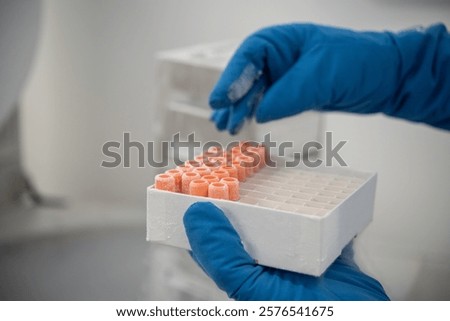Frozen samples in hands of scientist