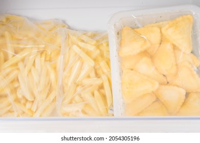 Frozen Semi-finished Products From French Fries And Dough Are In The Freezer Drawer