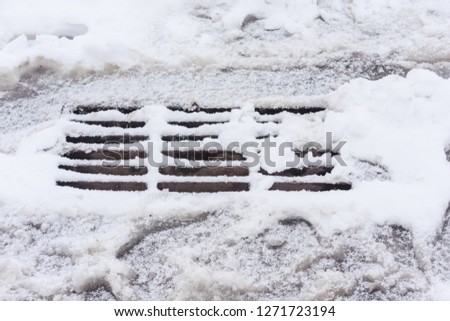frozen sewer grate, natural disasters