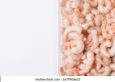 Frozen Shrimp Isolated. Plastic Vacuum Packaging. Empty Copy Space Seafood Background. 