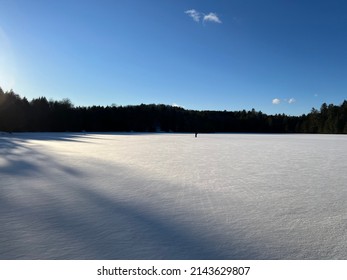 Frozen Snow Covered Lake In Winter