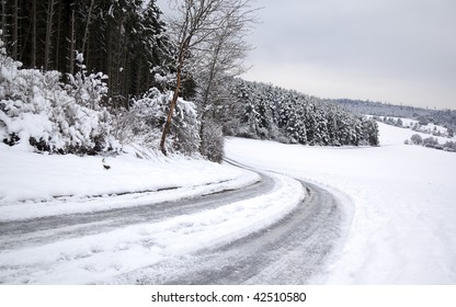 Frozen Snowy Road