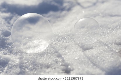 Frozen soap bubbles in the snow - Powered by Shutterstock