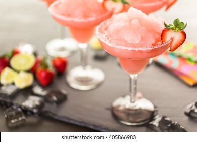 Frozen Strawberry Margarita Cocktail In Margarita Glass.