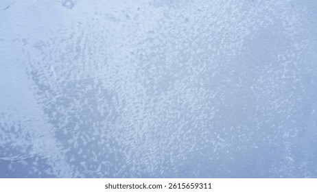Frozen surface texture, icy patterns, winter scene, outdoor