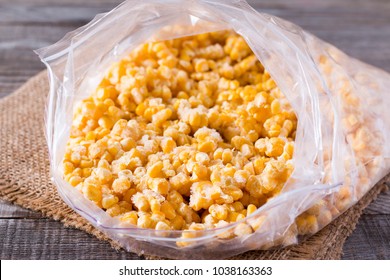 Frozen Sweet Corn In Bag On Table