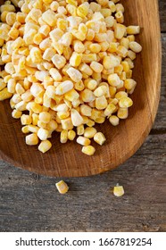 Frozen Sweet Corn On Woode Surface