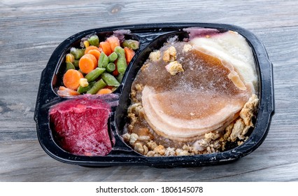 Frozen TV Dinner In Its Tray With Turkey And Vegetables