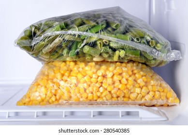 Frozen Vegetables In Bags In Freezer Close Up