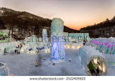 Frozen vertical ice pillars at Lake Shikotsu at sunset