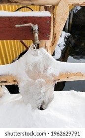 Frozen Water From A Dripping Faucet In Winter