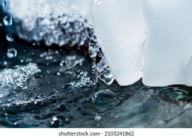 Frozen Water Icicle Photographed Up Close, Water And Ice Close Up, Art Winter Photography Of Icicle And Flowing Water, Water And Ice Close Close Up Photograph, Beautiful Winter Flowing Stream With Ice