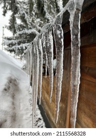 Frozen Water On A Chalet Roof 